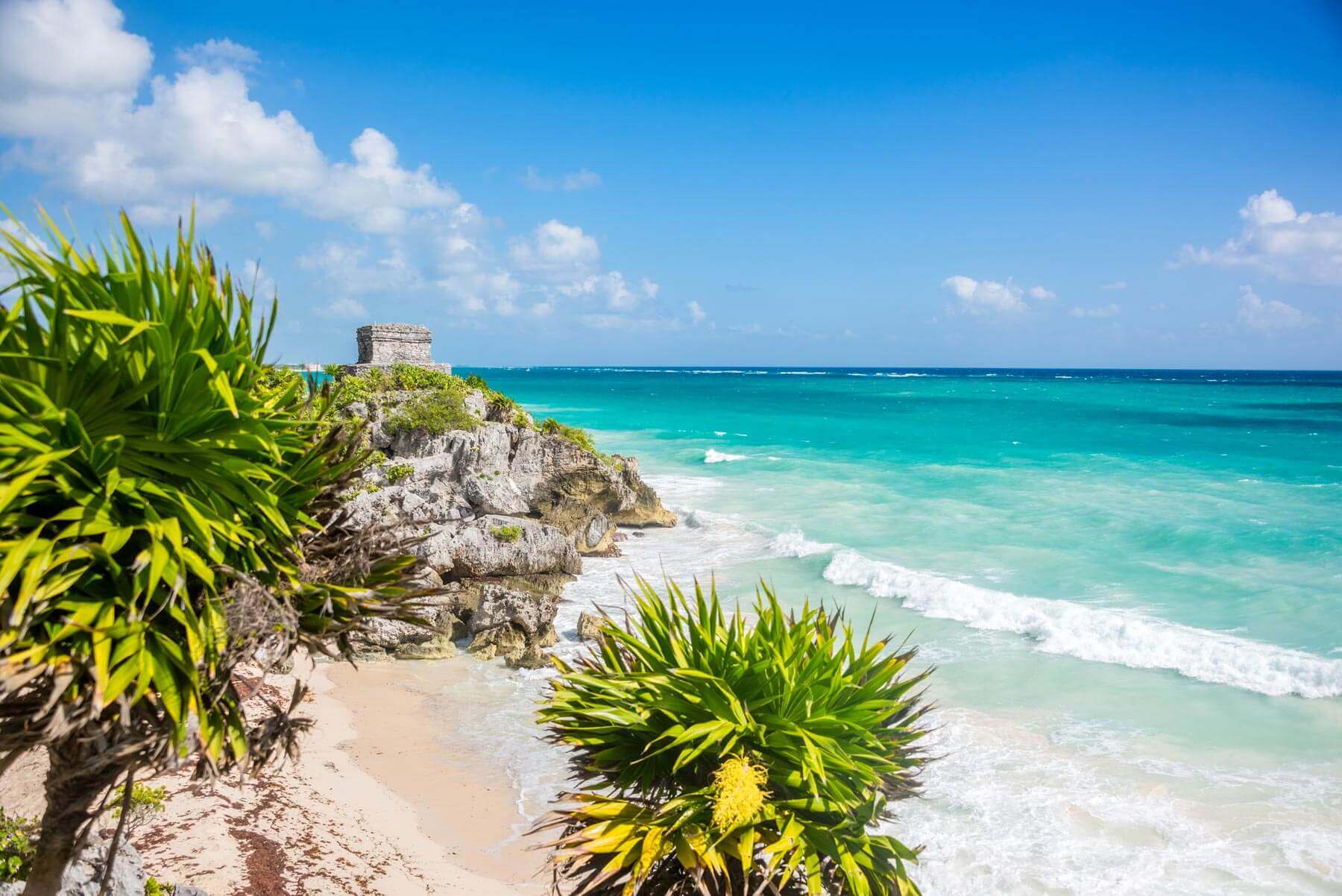 Tulum Riuns on the crystal clear beach in the Riviera Maya Mexico. 