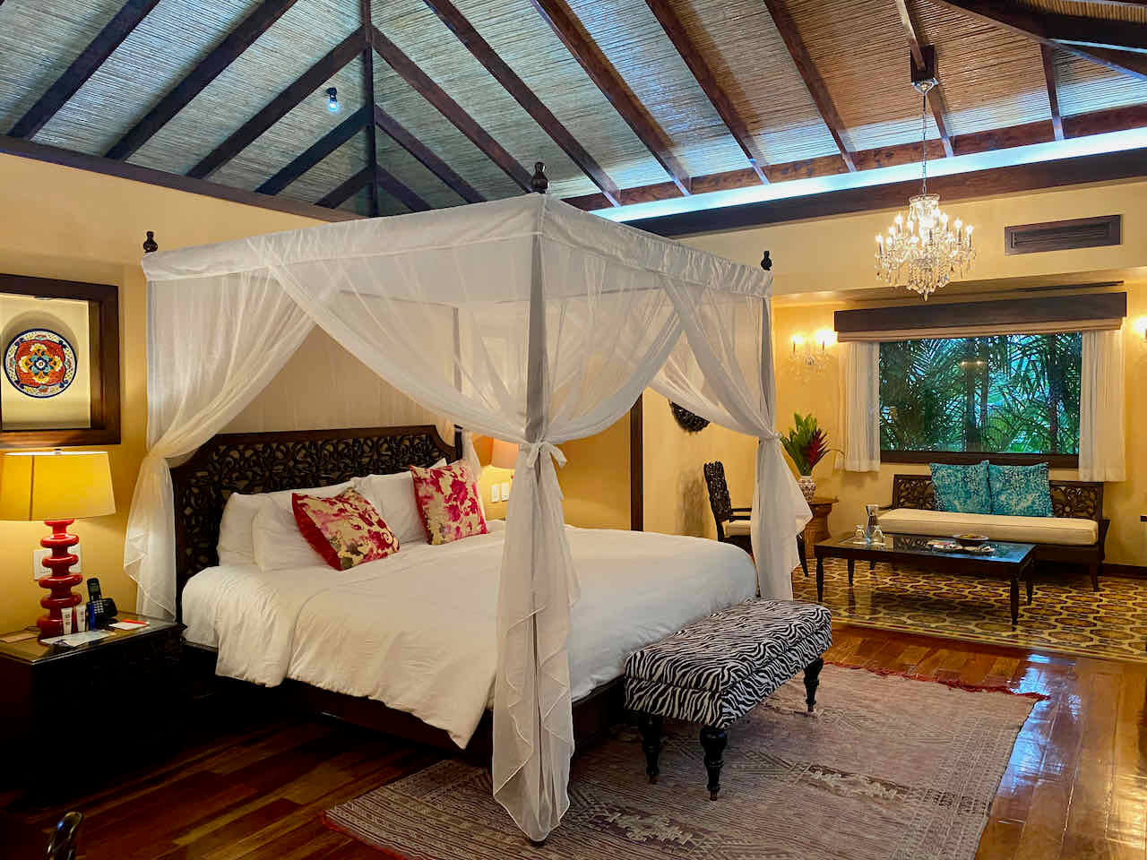 Four poster bed in private villa at Nayara Springs Resort in Costa Rica.