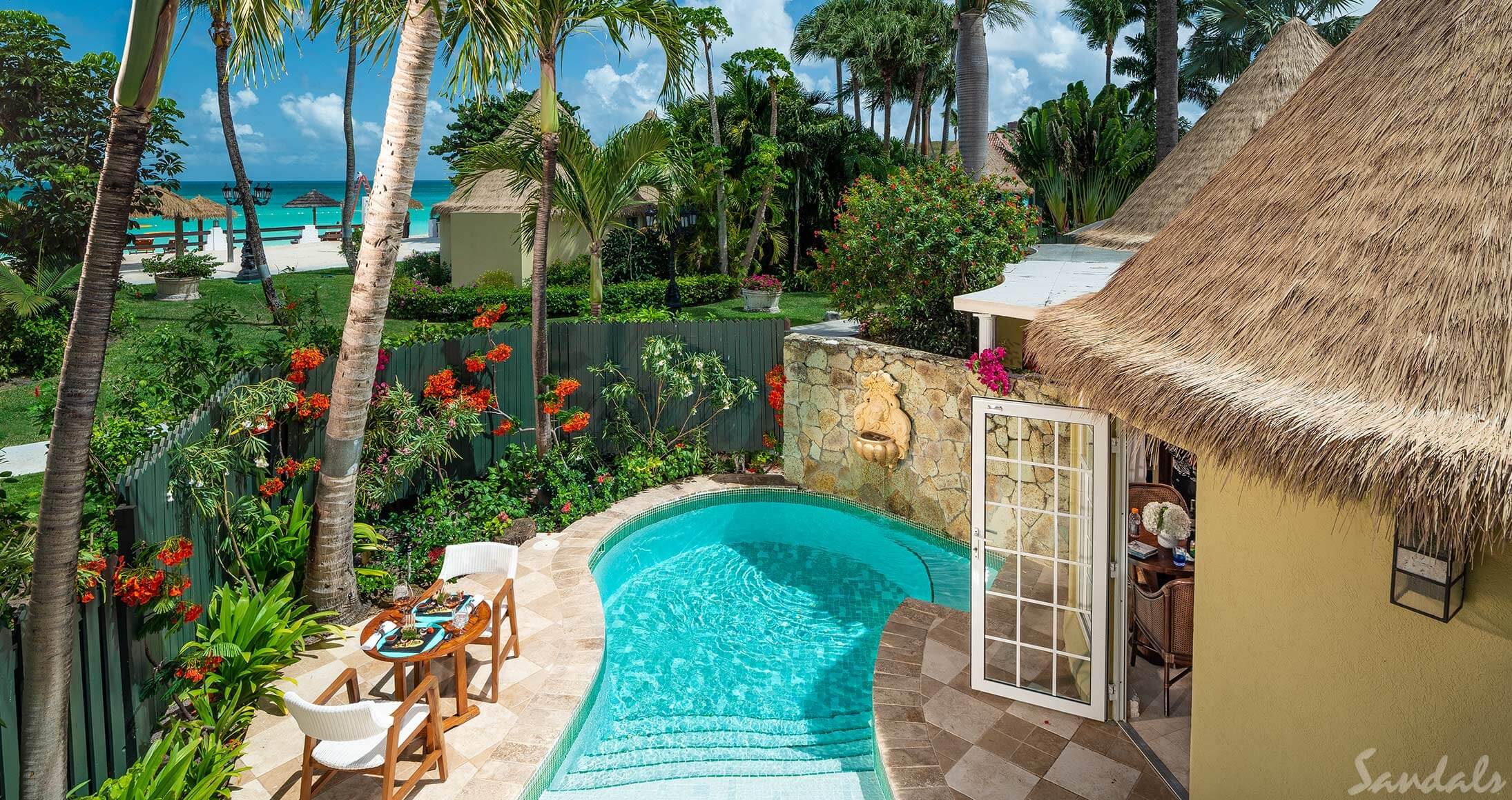 Private plunge pool in a garden at Sandals Grande Antigua. 