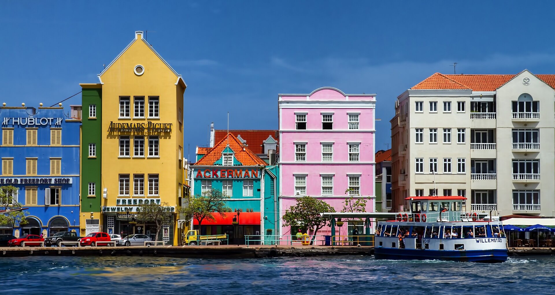 Colorful waterfront buildings in Curacao one of the best gay-friendly islands in the Caribbean.