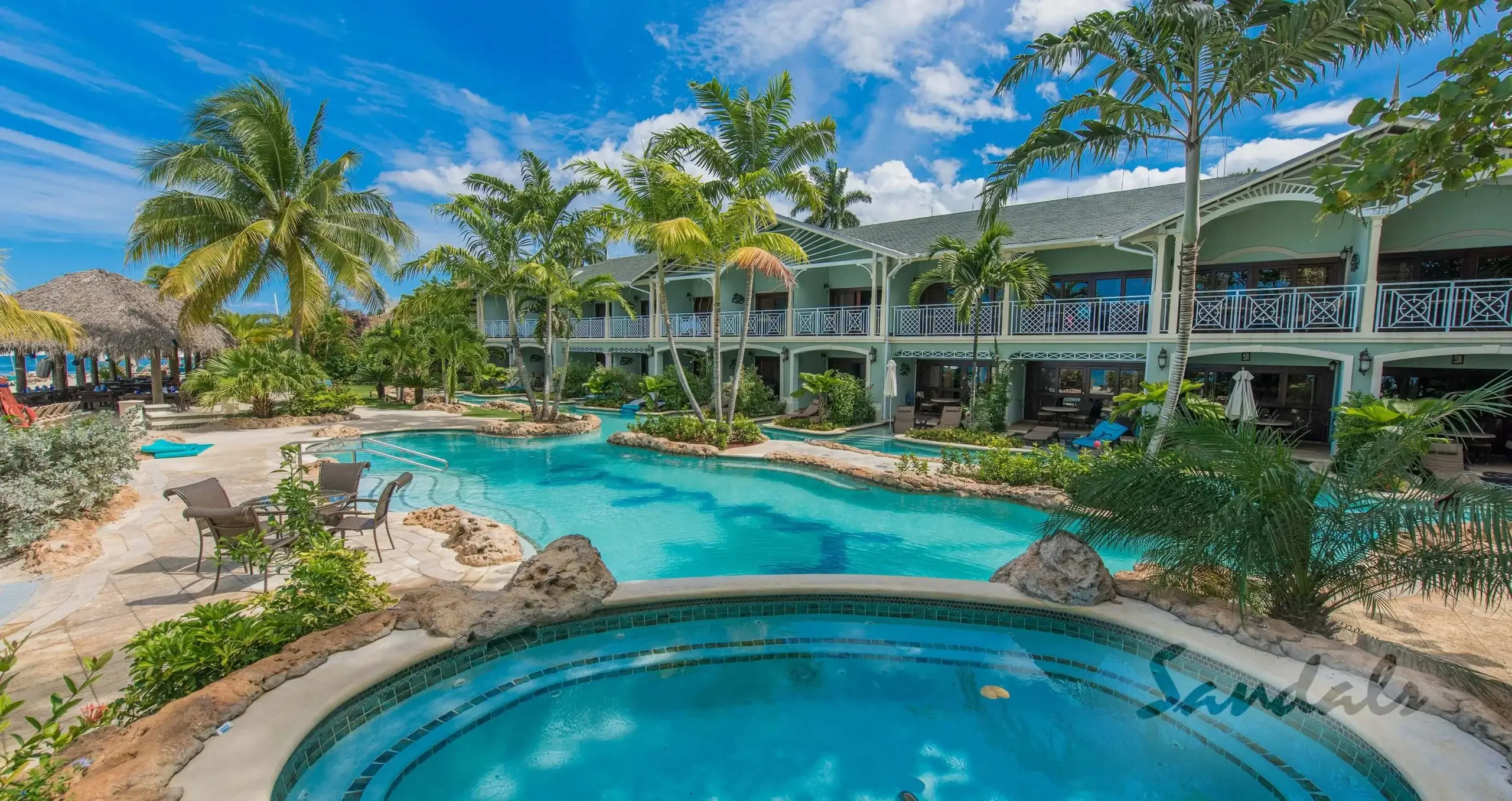 Sandals Negril with large swimming pool and beautiful ocean views in Jamaica.