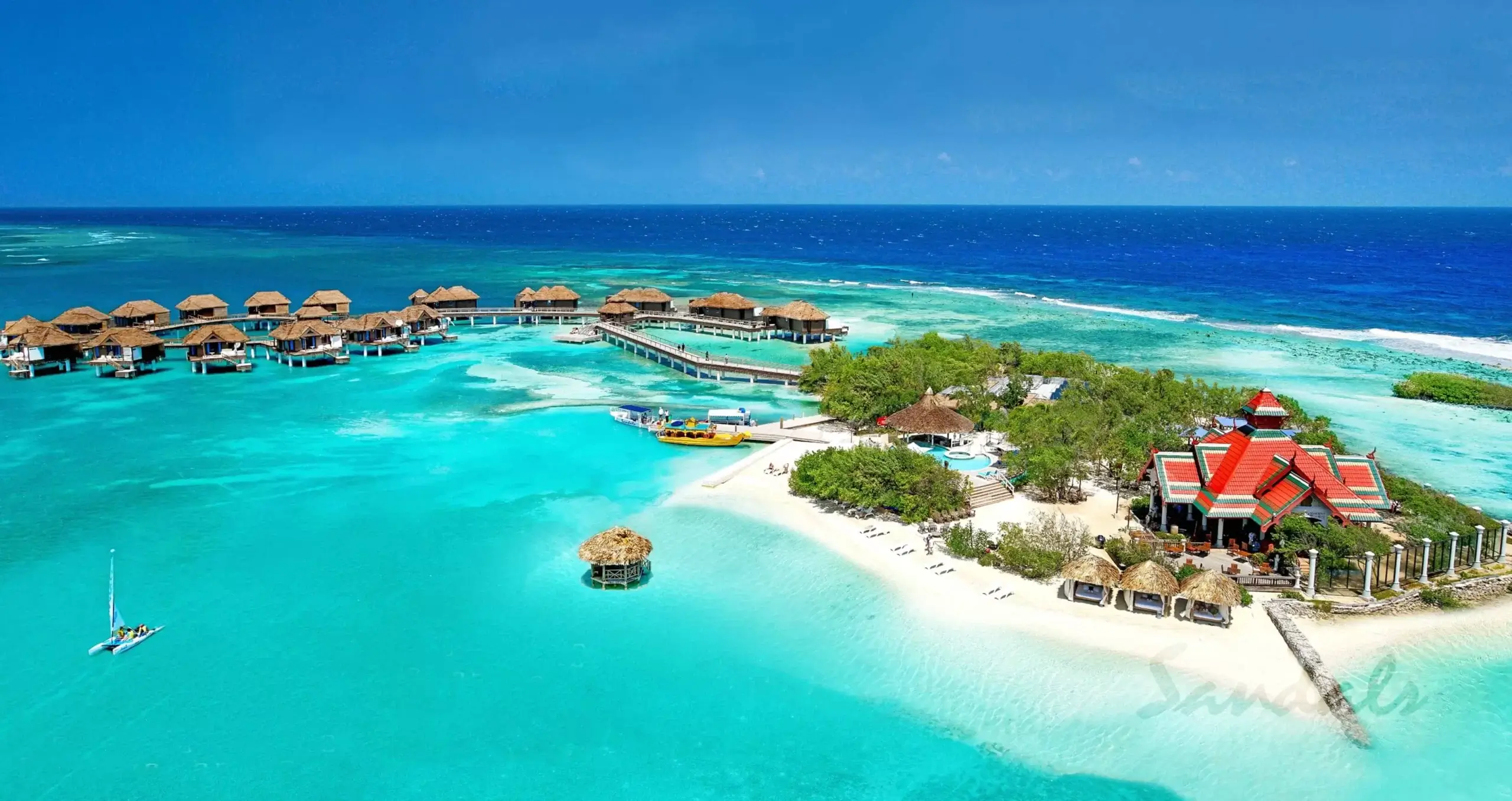 Private island resort with overwater bungalows in Jamaica. 