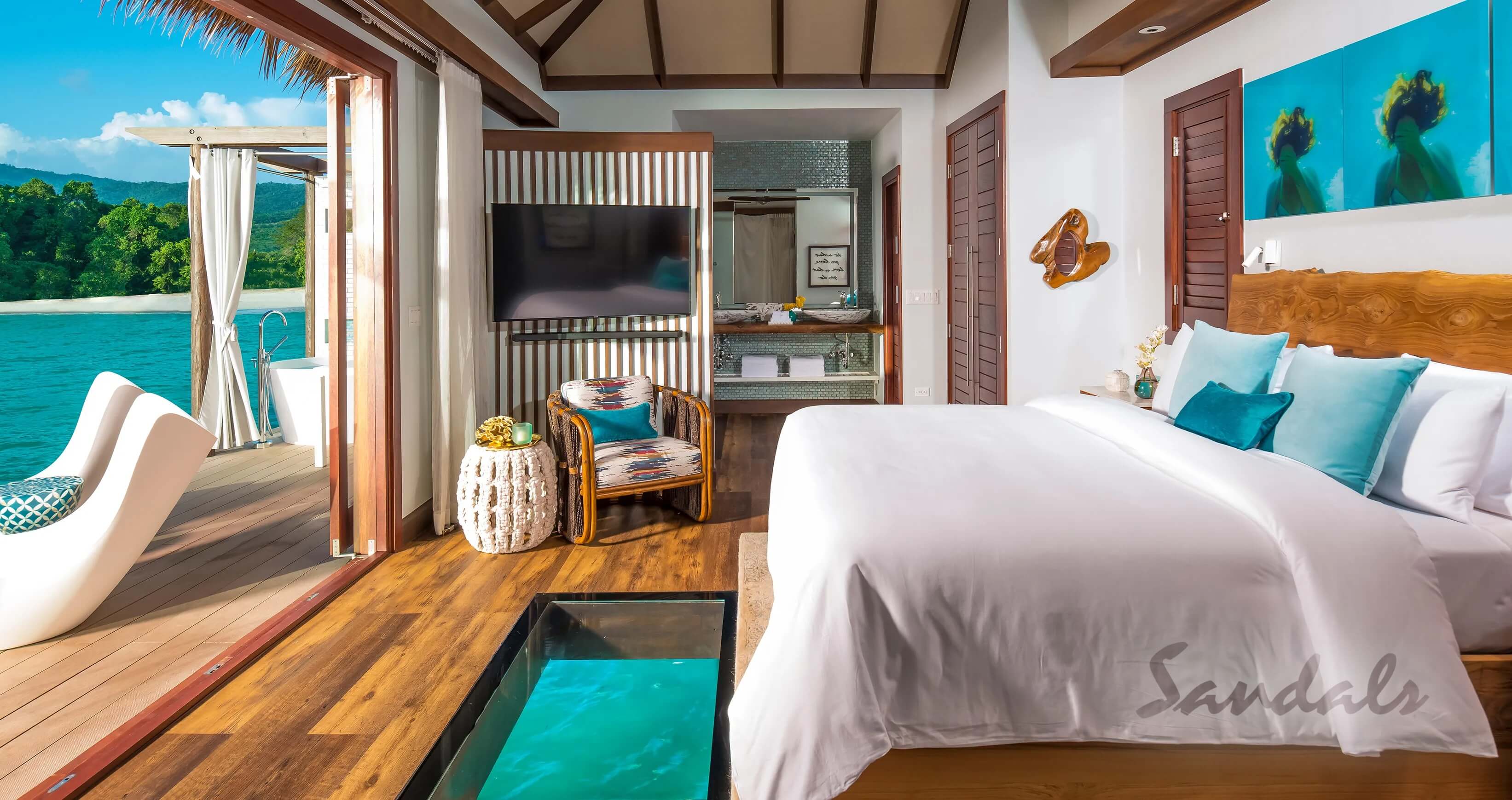 Overwater bungalow with clear floor to see tropical fish at Sandals resorts in Jamaica.