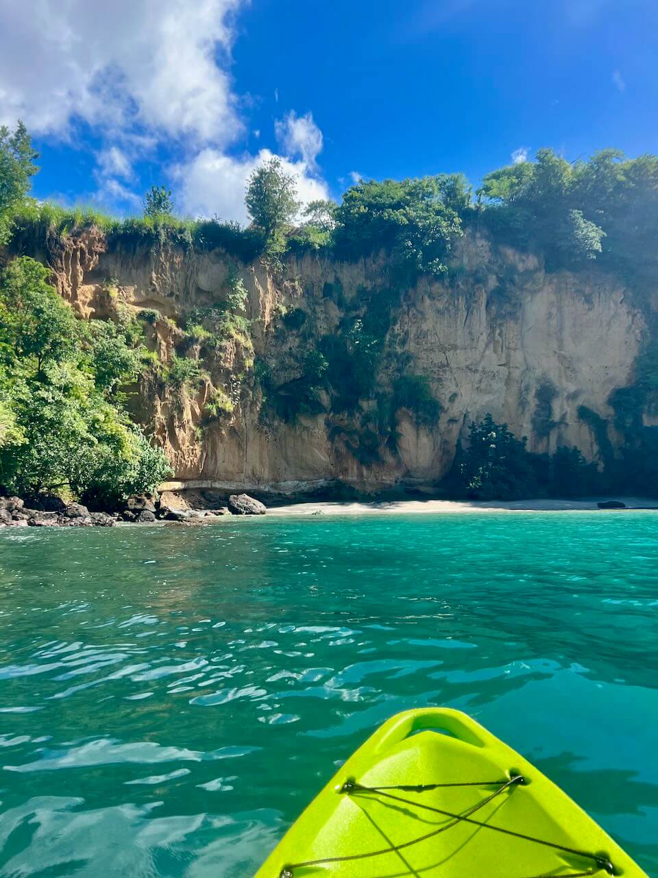 kayak in caribbean sea at secret bay in dominica