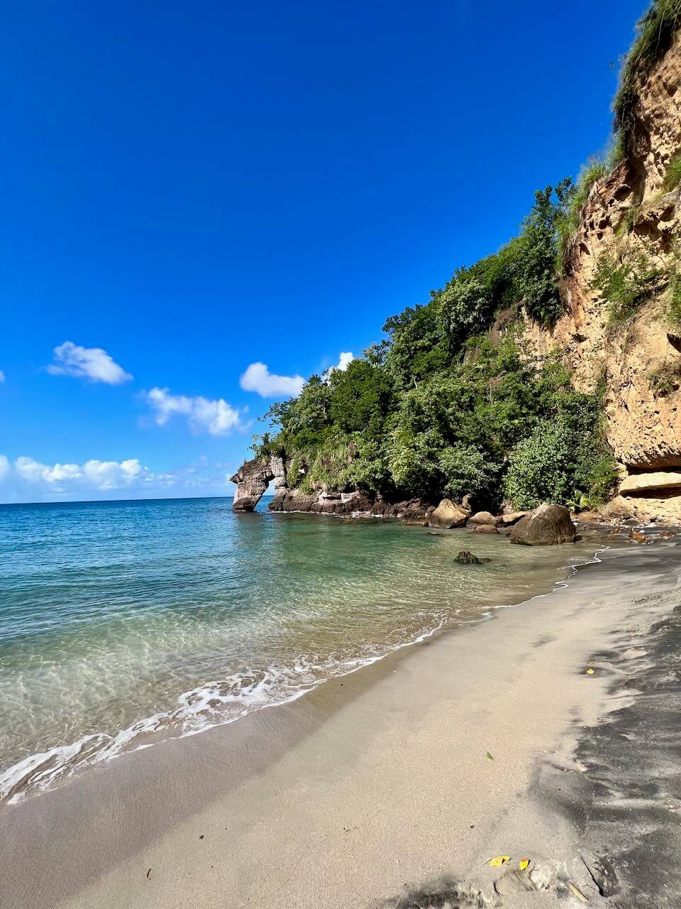 clear water beach on dominica at secret bay hotel